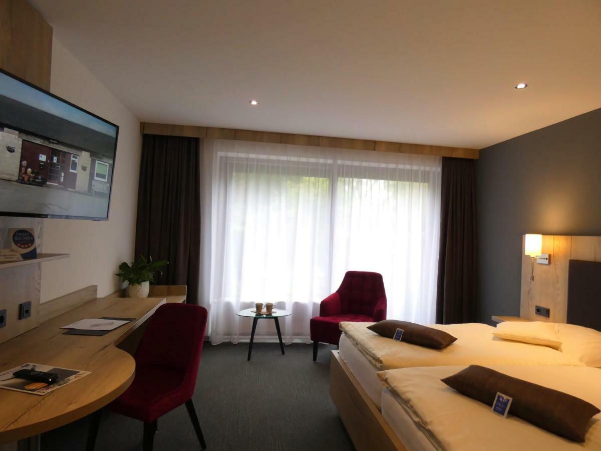 Akzent Hotel Cordes & Restaurant Am Rosengarten Sottorf Extérieur photo